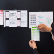 UX-UI team brainstorming on color samples for mobile responsive website development