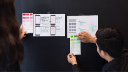 UX-UI team brainstorming on color samples for mobile responsive website development
